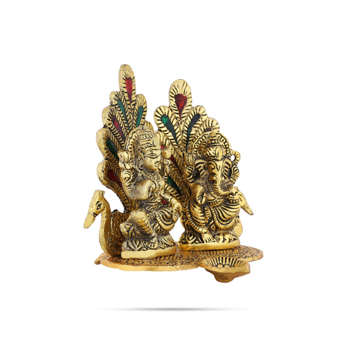 Metal Lakshmi Ganesh Murti Sitting On Peacock Base With Deep - 5 x 5.5 Inches | Gold Polish Lamp for Home