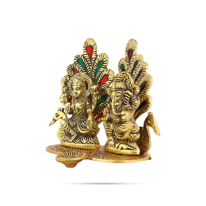 Metal Lakshmi Ganesh Murti Sitting On Peacock Base With Deep - 5 x 5.5 Inches | Gold Polish Lamp for Home