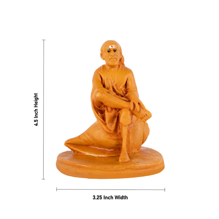 Saibaba Sitting On Shank Base Murti - 4.5 x 3.25 Inches| Resin Wood Finish Idol/ Sai Ram Statue For Home & Pooja
