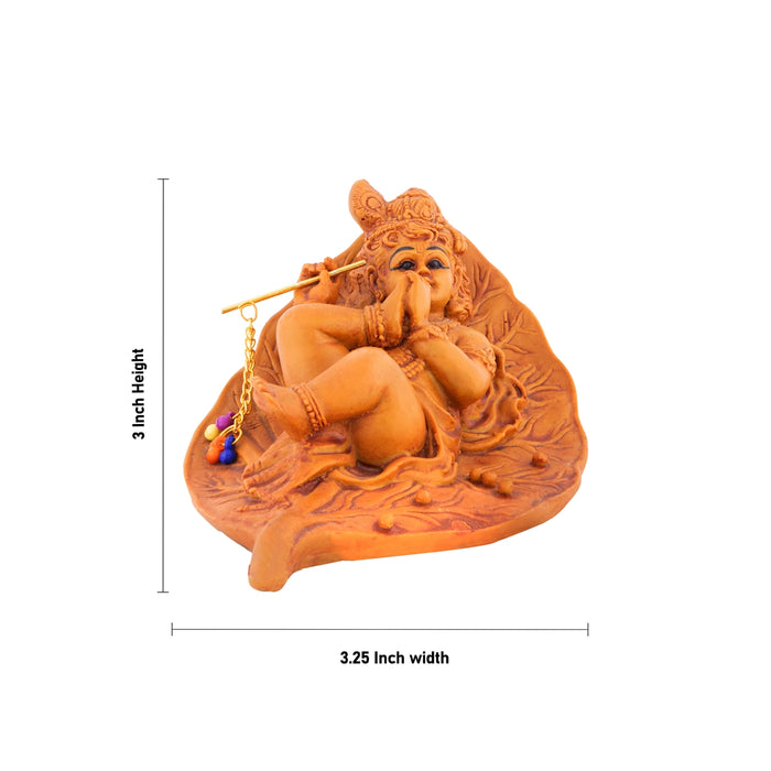 Leaf Krishna Sleeping On Base Statue - 3 x 3.25 Inches | Resin Idol/ Krishna Murti For Home & Festive Decor